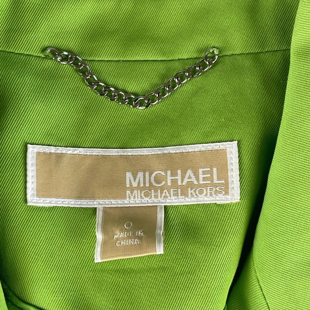 Michael Kors command attention